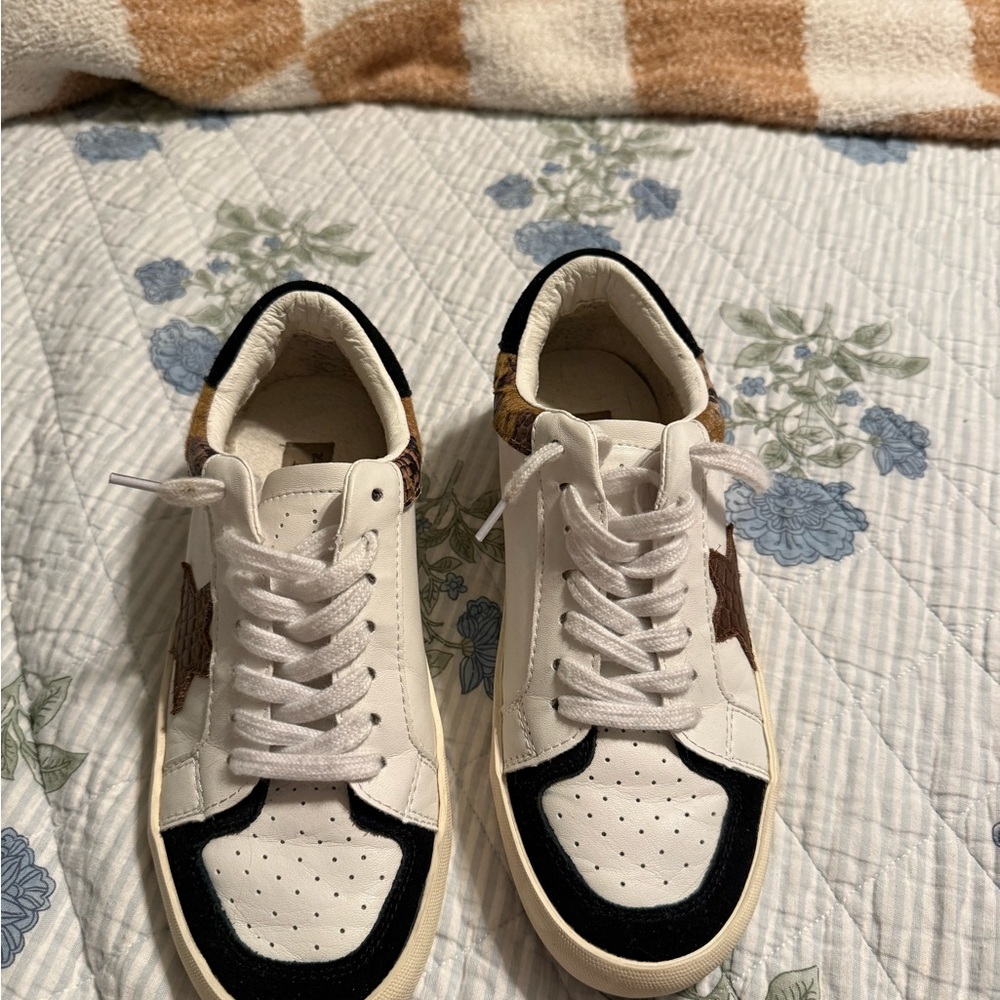 White Leather Sneakers with Black Trim and Brown Star Accent